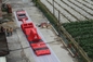 أحمر عائق قابل للنفخ ملعب عائم ماء متنزه للأطفال تحت 12 سنة